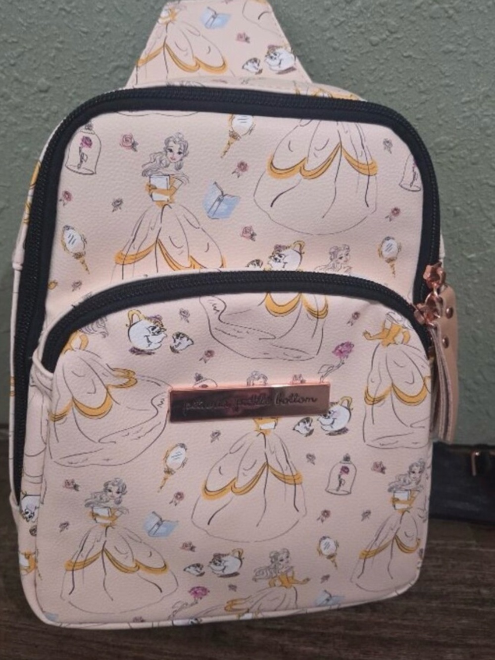 Petunia Pickle Bottom Cream Cartoon-Print Sling Backpack with Black Strap